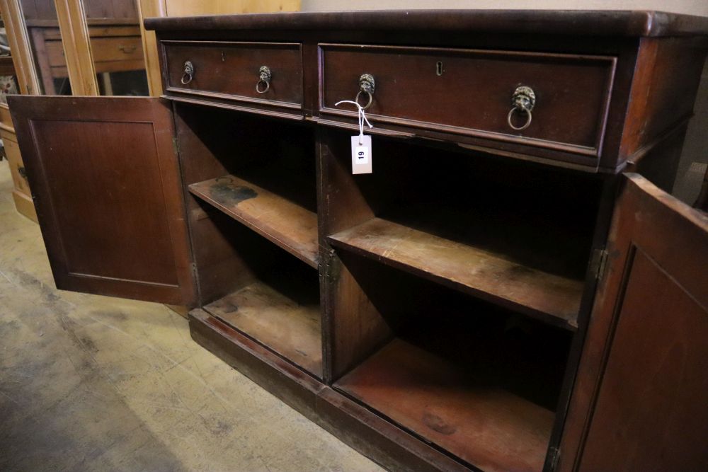 An early Victorian mahogany cabinet, fitted two drawers over panelled doors, width 114cm depth 67cm height 96cm